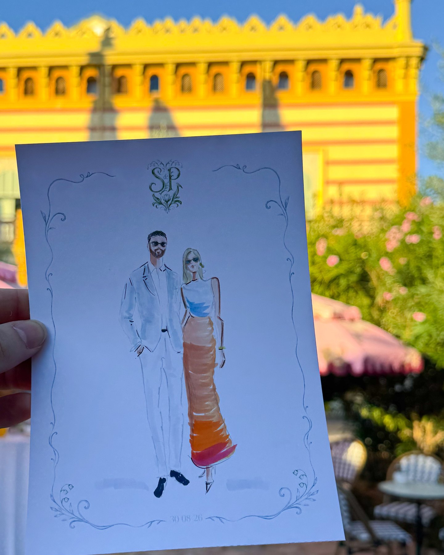 Retrato terminado con el marco en verdes y azules de la boda